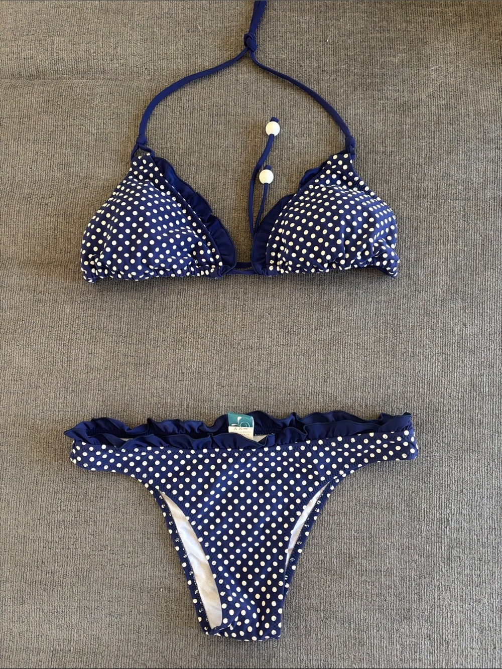NWOT L*SPACE White and navy polka dot set with ruffled edges. Size small.